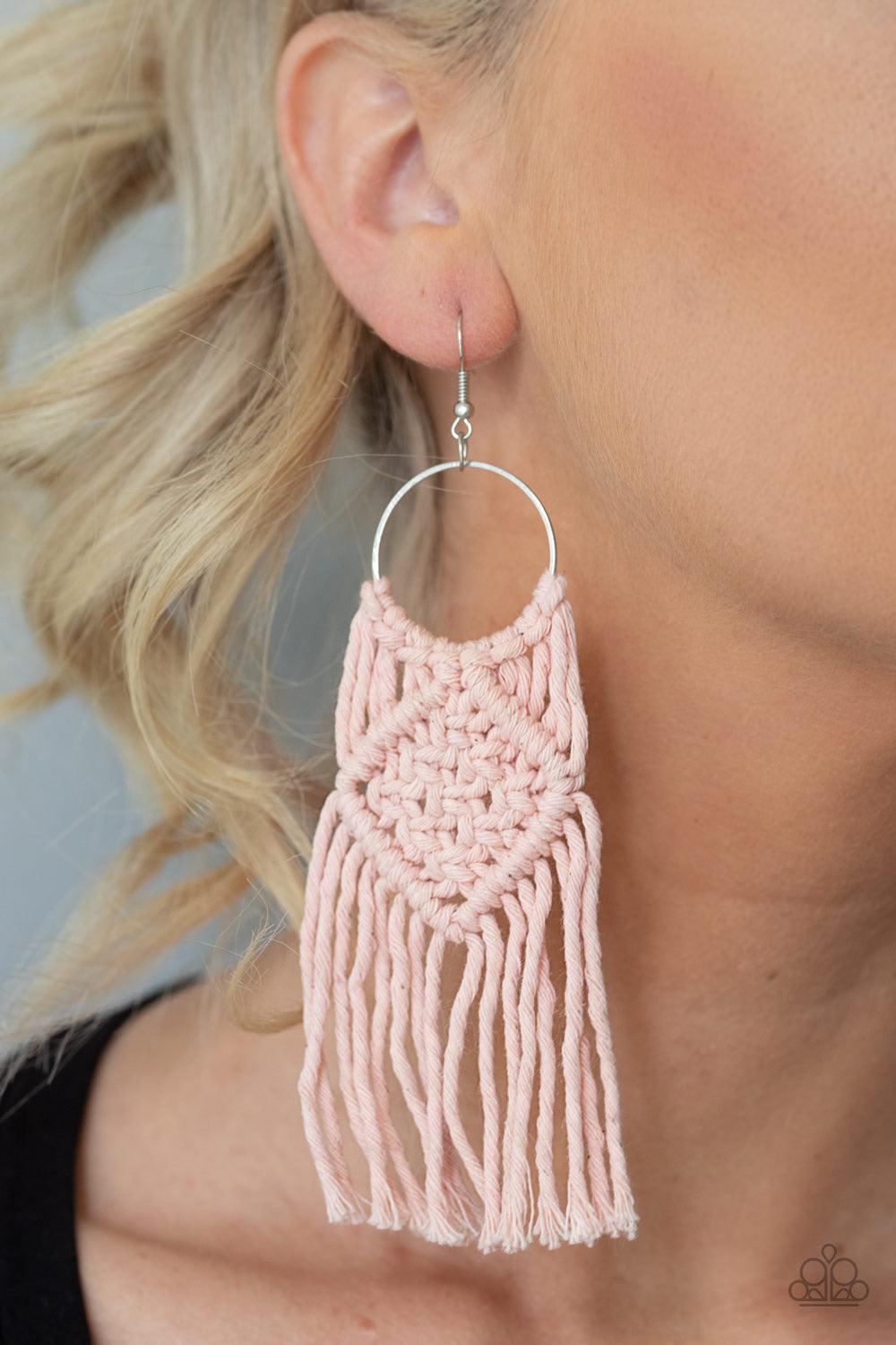 Paparazzi Accessories Macrame Rainbow - Pink Soft pink cording knots around the bottom of a dainty silver hoop, weaving into a colorful macrame fringe. Earring attaches to a standard fishhook fitting. Jewelry