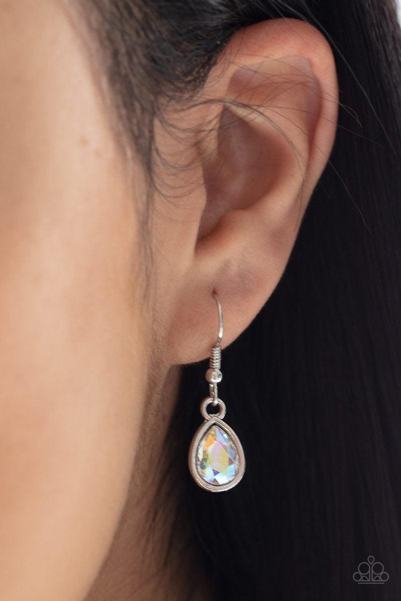 Paparazzi Accessories Don’t Mind If I Dew - Multi Featuring a rainbow iridescence, three glittery teardrop rhinestones gradually increase in size as they drip from the bottom of a lengthened silver chain. A lobster clasp hangs from the bottom of the desig