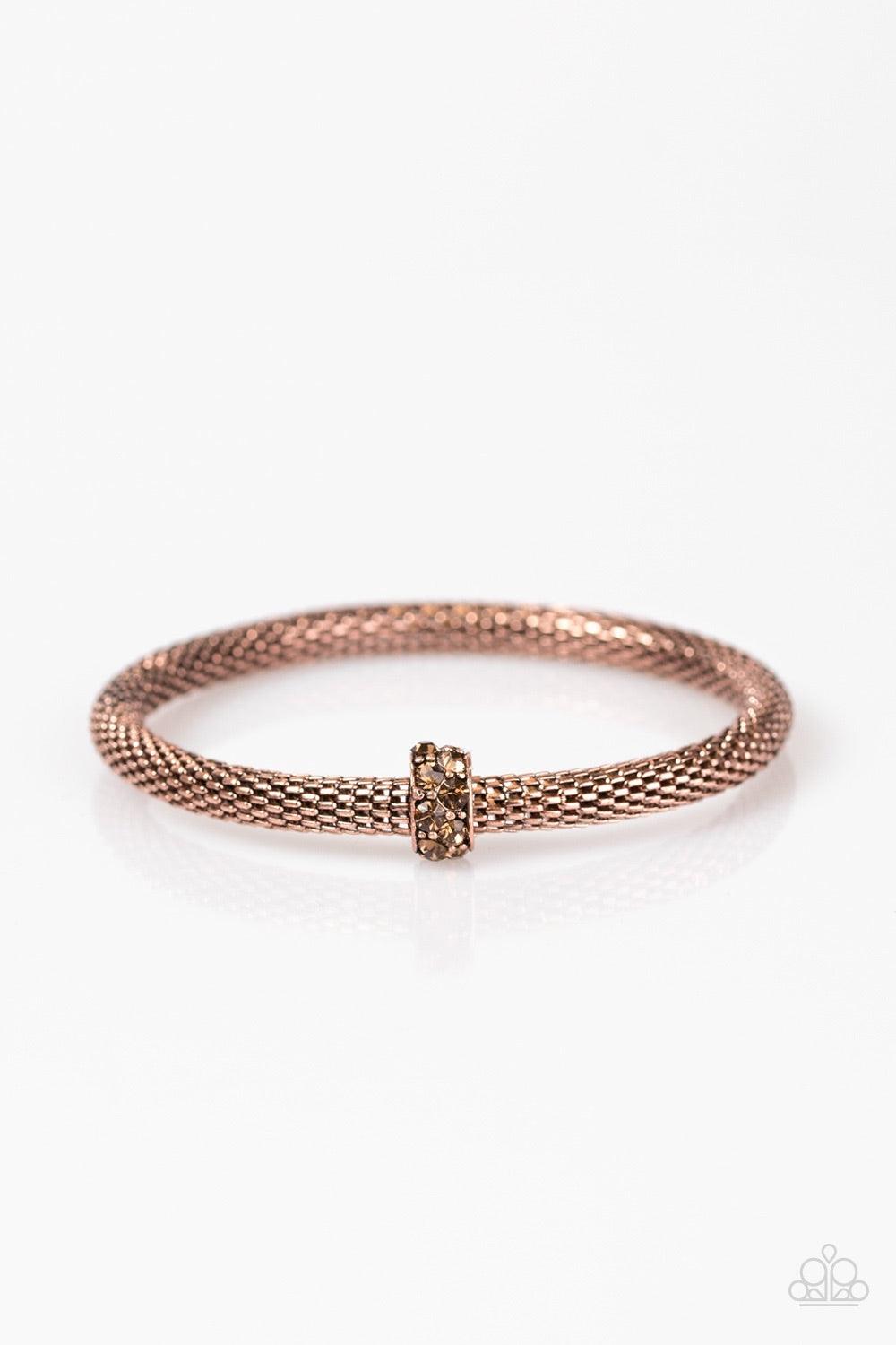 Paparazzi Accessories CACHE Or Card? - Copper Shimmery copper mesh chain joins into a thick bangle around the wrist. Encrusted in glittery topaz rhinestones, a copper ring slides along the bangle, adding sassy sparkle to the edgy palette. Jewelry
