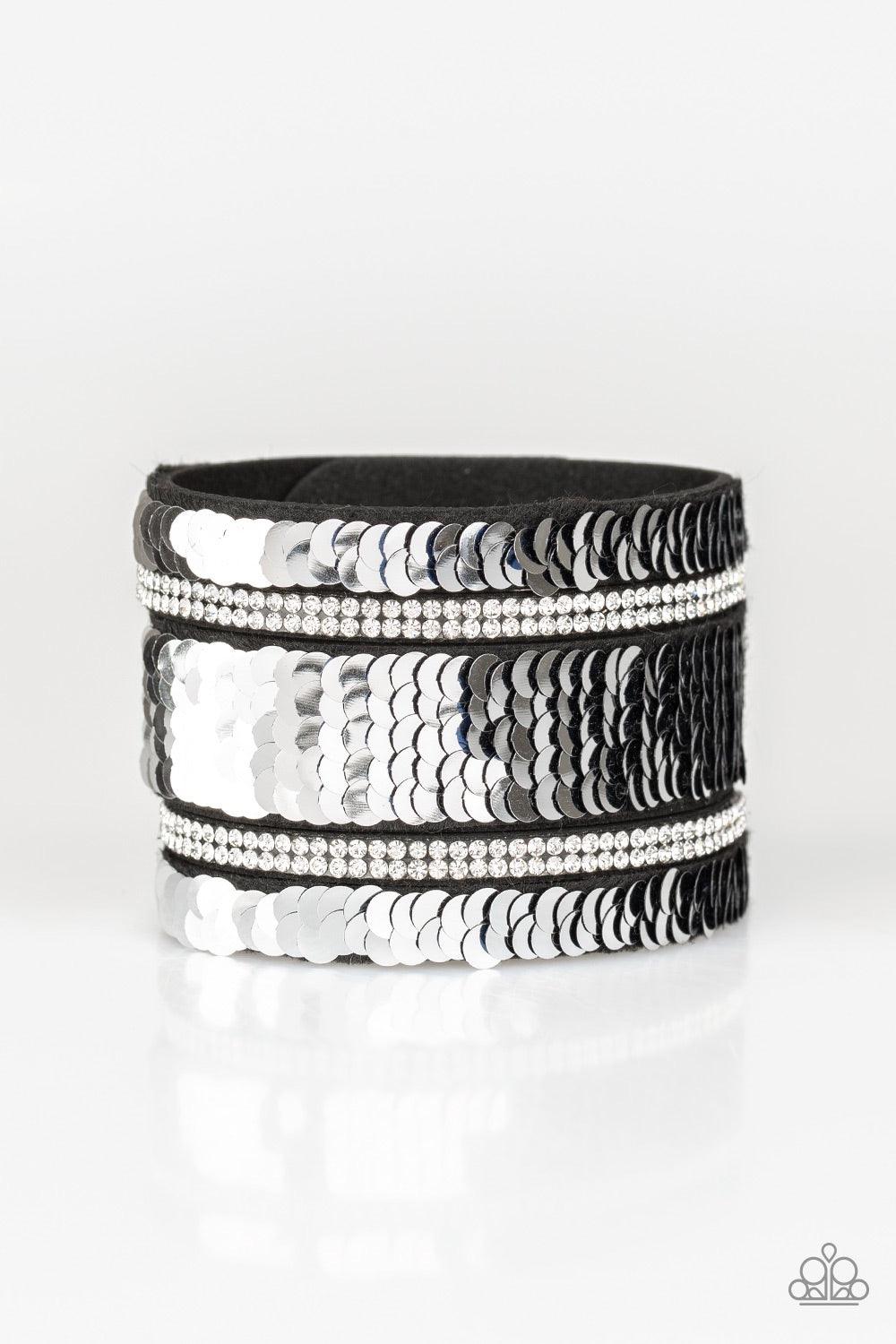 Paparazzi Accessories MERMAID Service - Blue Infused with strands of blinding white rhinestones, row after row of shimmery sequins are stitched across the front of a spliced black suede band. Bracelet features reversible sequins that change from silver to