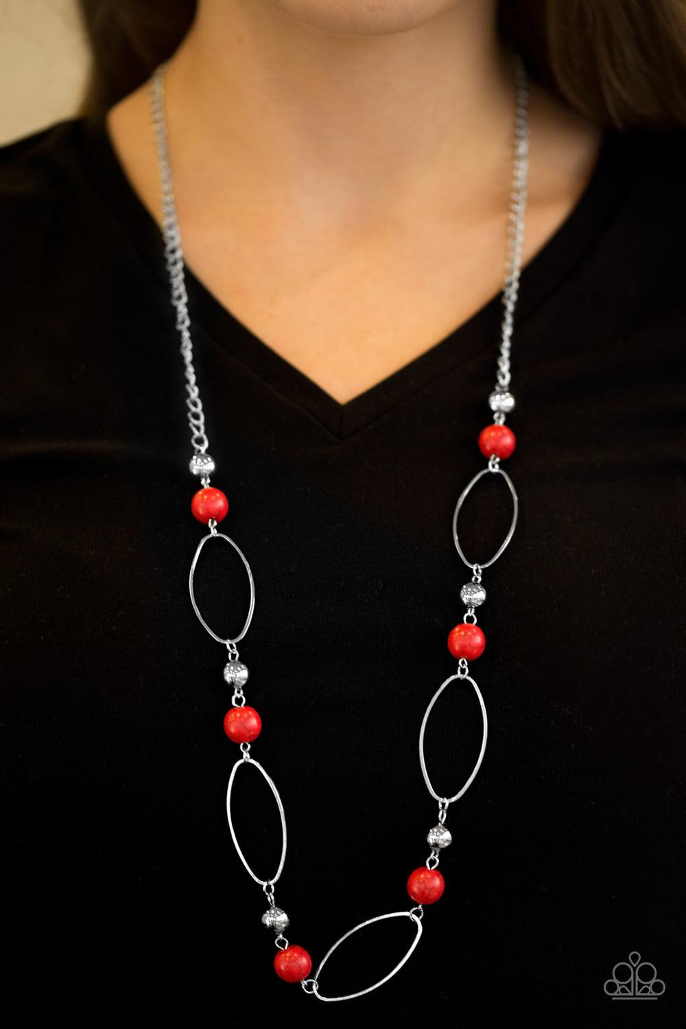 Paparazzi Accessories Simple Stonework - Red Fiery red stones and classic silver beads join airy silver hoops along a silver chain for a seasonal look. Features an adjustable clasp closure. Sold as one individual necklace. Includes one pair of matching ea