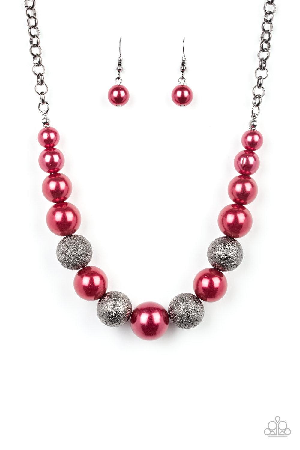 Paparazzi Accessories Color Me CEO - Red Dusted in glitter, sparkling gunmetal and pearly red beads are threaded along an invisible wire below the collar for a glamorous look. Features an adjustable clasp closure. Jewelry