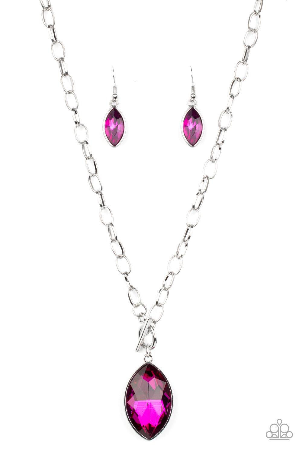 Paparazzi Accessories Unlimited Sparkle ~Pink Featuring a regal marquise style cut, a dramatically oversized Pink Peacock rhinestone swings from a chunky silver chain, creating a gorgeous pendant below the collar. Features a toggle closure. Sold as one in