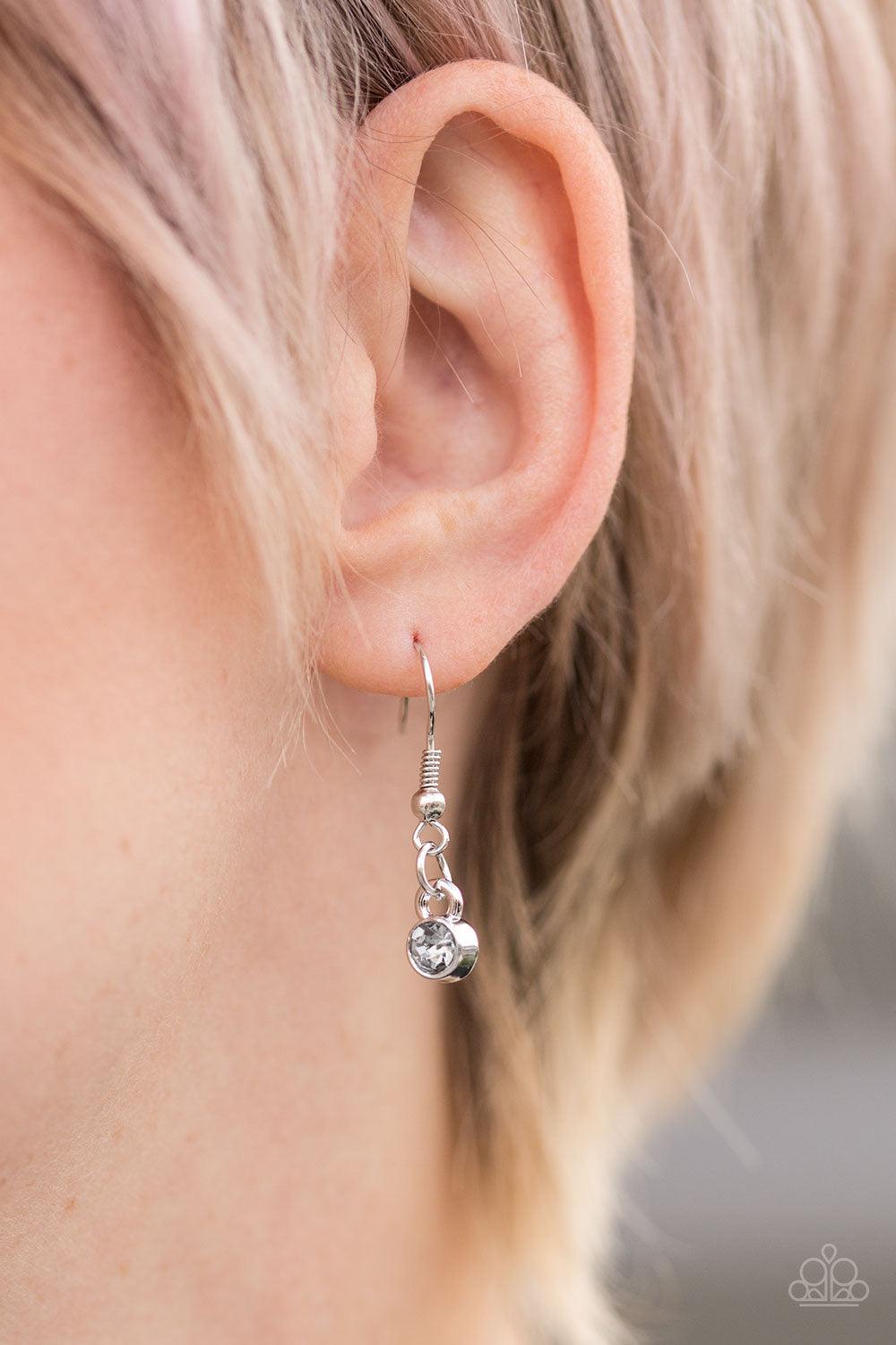 Paparazzi Accessories Over The Edge - Silver Encrusted in glittery smoky rhinestones, dainty diamond-shaped frames give way to matching silver frames, creating an edgy fringe below the collar. Features an adjustable clasp closure. Jewelry