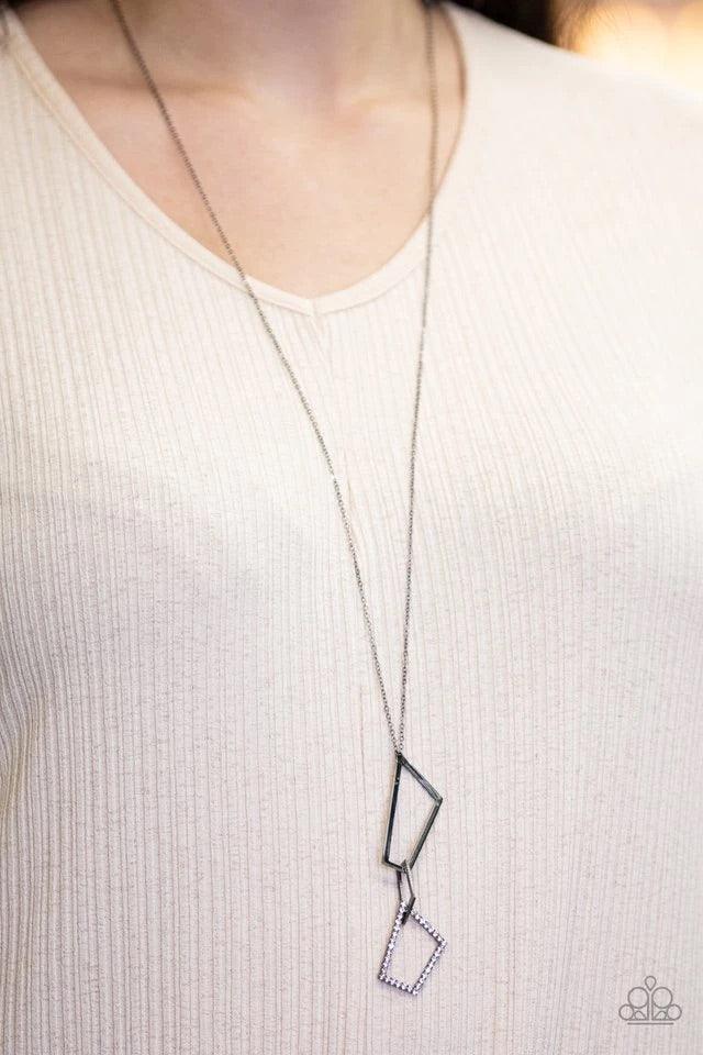 Paparazzi Accessories Shapely Silhouettes - Black Strand after strand of metallic gold and silver seed beads fall together to create a bold statement piece. Features an adjustable clasp closure. Sold as one individual necklace. Includes one pair of matchi