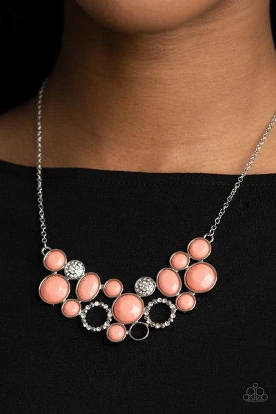 Paparazzi Accessories Extra Eloquent - Orange A mismatched collection of faceted coral beaded frames and white rhinestone embellished accents delicately connect into a bubbly clustered pendant below the collar, creating a colorful statement piece. Feature