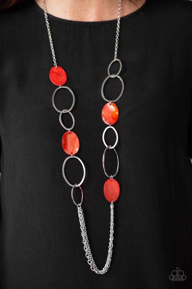 Paparazzi Accessories Kaleidoscope Coasts - Red Brushed in a shell-like iridescence, a collection of flat red beads and mismatched silver hoops give way to layers of silver chains down the chest for a whimsical look. Features an adjustable clasp closure.