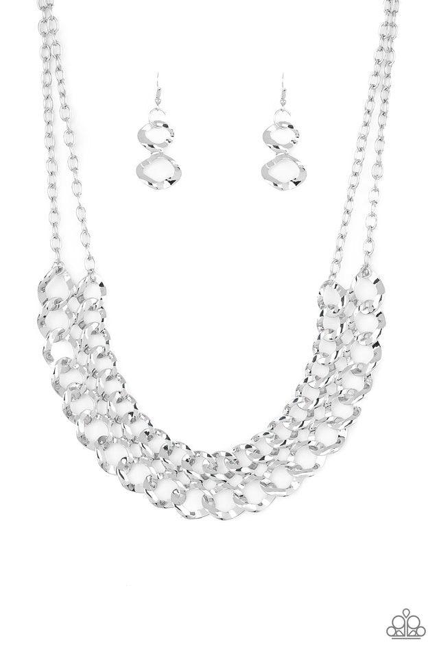 Paparazzi Accessories Street Meet And Greet ~Silver Asymmetrical silver frames connect below the collar, creating a bold web-like fringe for a statement-making look. Features an adjustable clasp closure. Jewelry