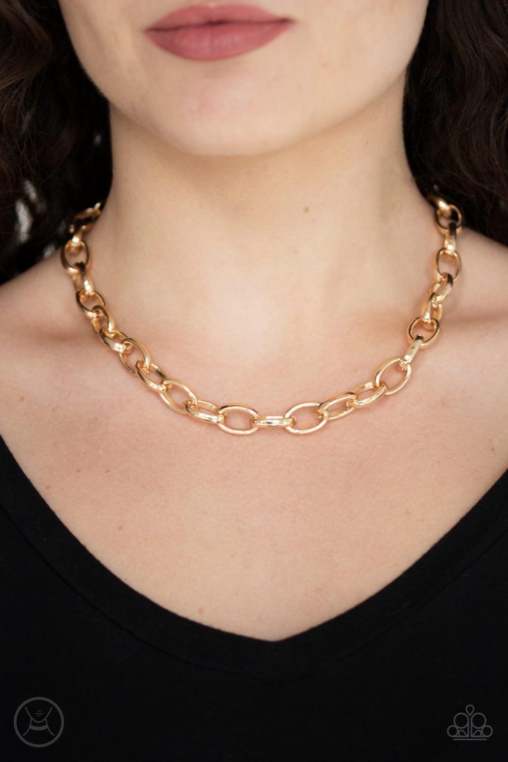 Paparazzi Accessories Urban Uplink - Gold Oversized gold links connect below the collar for a bold urban look. Features an adjustable clasp closure. Jewelry