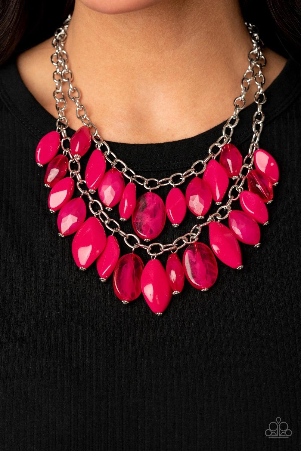 Paparazzi Accessories Palm Beach Beauty - Pink Two boisterous rows of glassy, opaque, and faceted pink beads boldly layer below the collar for a vivaciously colorful look. Features an adjustable clasp closure.Sold as one individual necklace. Includes one