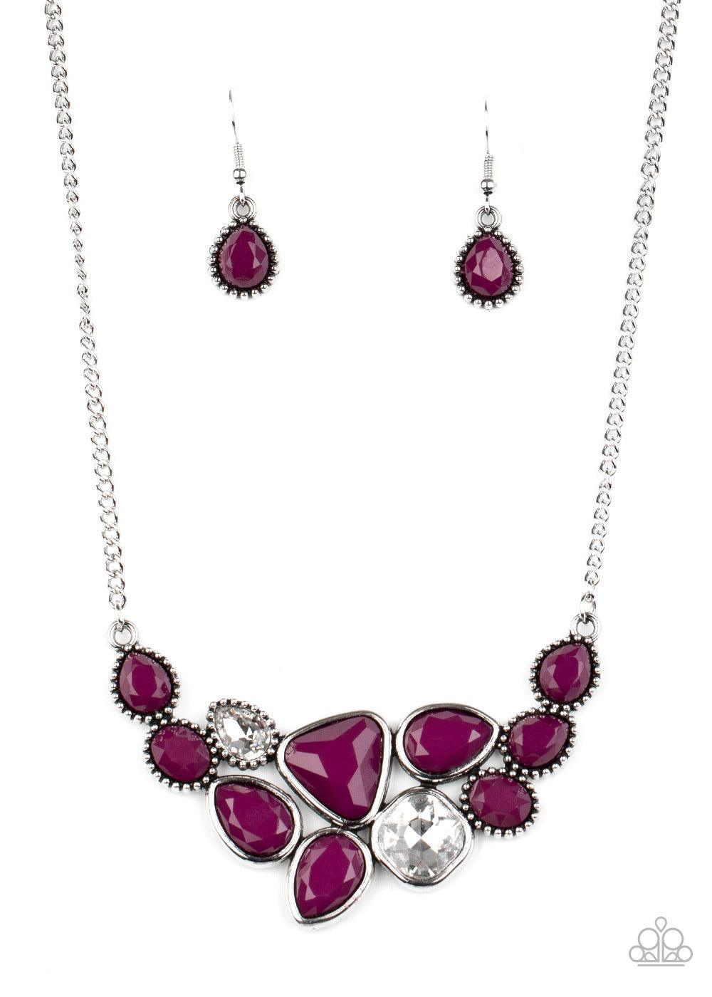 Paparazzi Accessories Breathtaking Brilliance - Purple Featuring smooth and studded silver frames, a collection of teardrop, oval, and triangular plum beads coalesce with matching white rhinestones below the collar for a glamorous pop of collar. Features