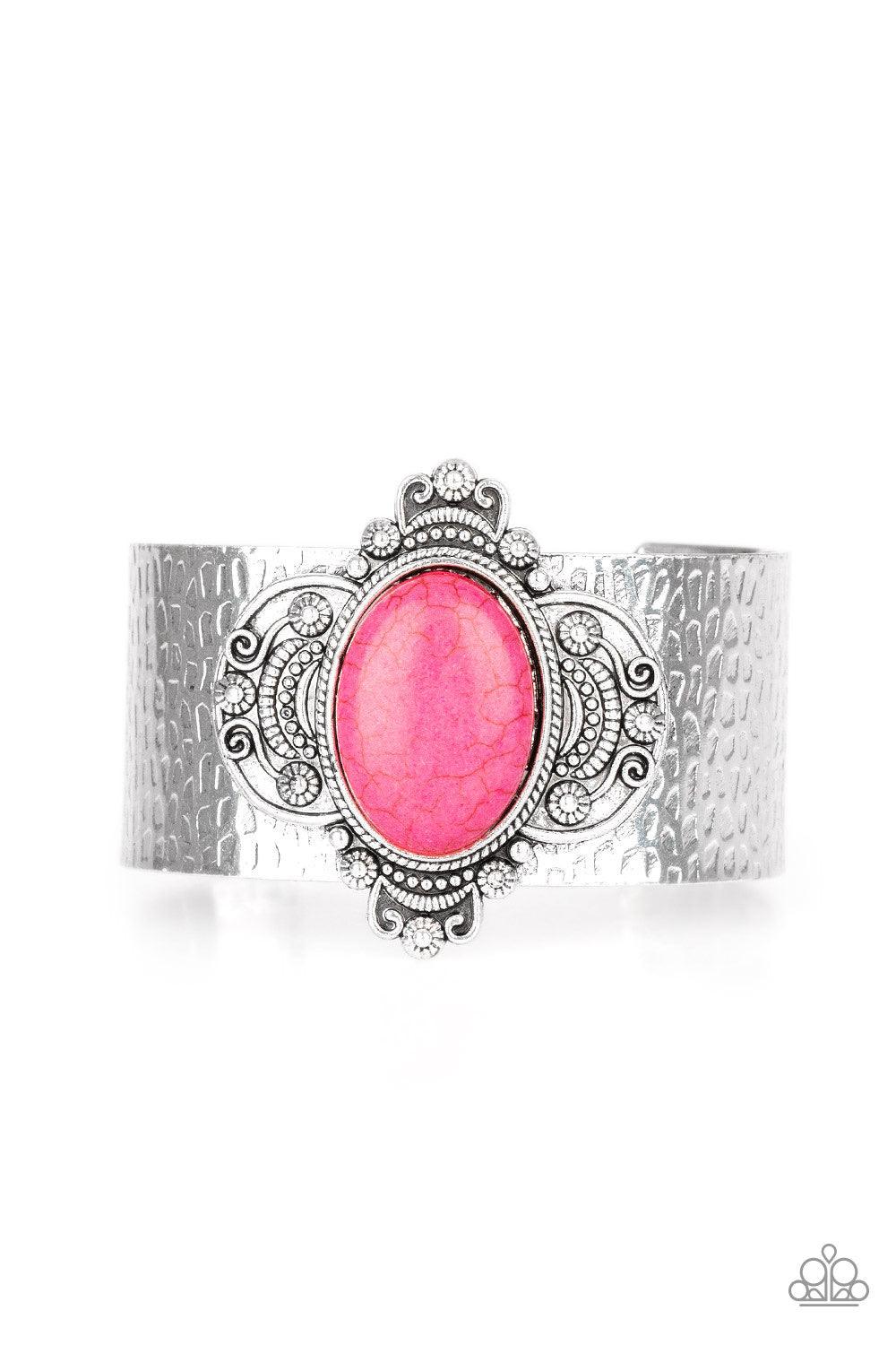 Paparazzi Accessories Yes I CANYON ~Pink Featuring a vivacious pink stone center, an ornate silver frame adorns the center of a hammered silver cuff for an artisan inspired look. Sold as one individual bracelet.