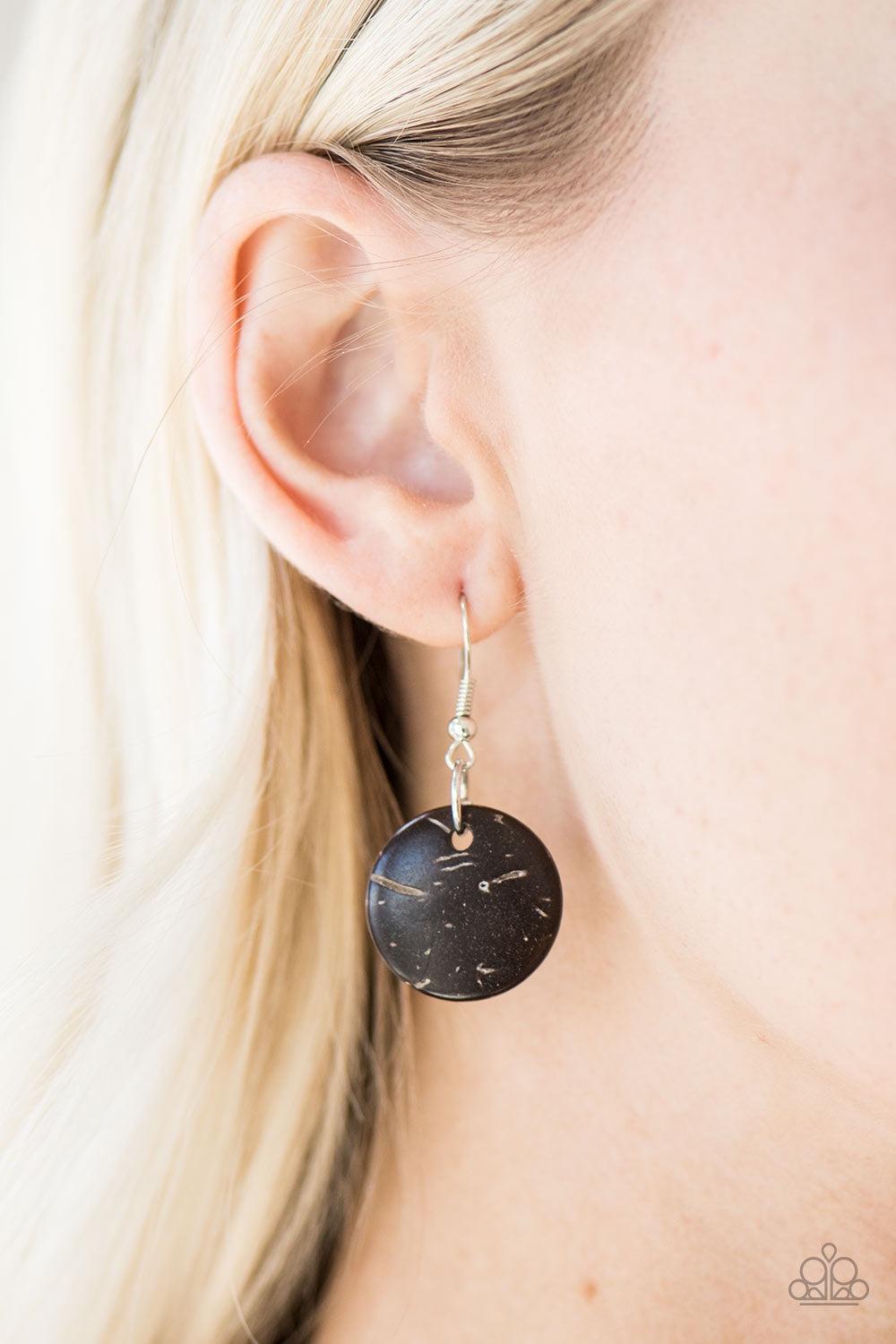Paparazzi Accessories Greetings From Tahiti - Brown Brushed in a brown finish, wood discs are knotted in strands of brown cording for a tropical look. Polished wooden accents are added to the whimsical palette, adding an earthy flair to the seasonal piece