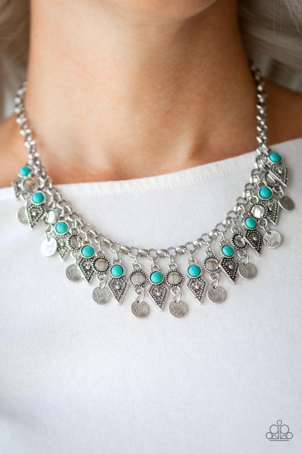 Paparazzi Accessories Jurassic Jamboree - Blue Featuring studded detail and refreshing turquoise stone accents, mismatched silver frames swing from the bottom of a bold silver chain, creating a flirty fringe below the collar. Features an adjustable clasp