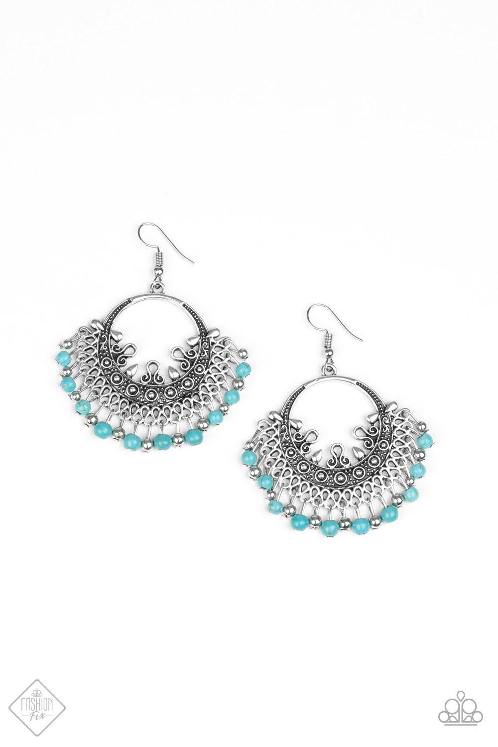 Paparazzi Accessories Canyonlands Celebration - Blue A fringe of dainty silver beads and refreshing turquoise stone beads swings from the bottom of an ornate silver hoop dotted in intricate detail. Earring attaches to a standard fishhook fitting. Jewelry