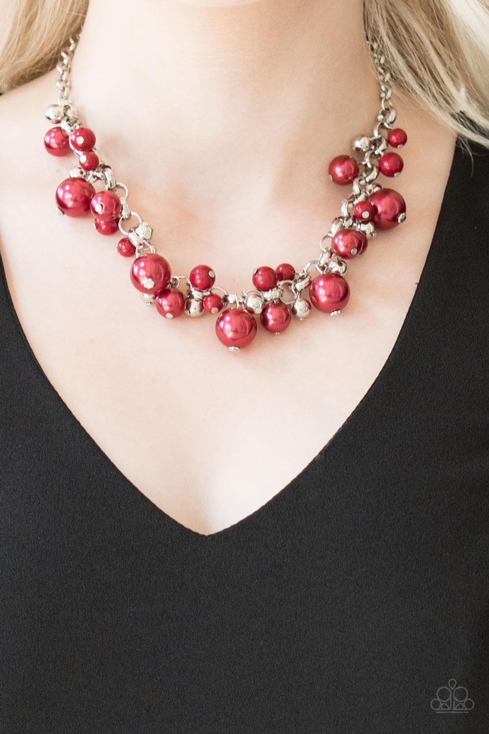 Paparazzi Accessories The Upstater - Red Varying in size, bubbly red pearls, classic silver beads, and shiny red beads swing from the bottom of a glistening silver chain, creating a refined fringe below the collar. Features an adjustable clasp closure. So
