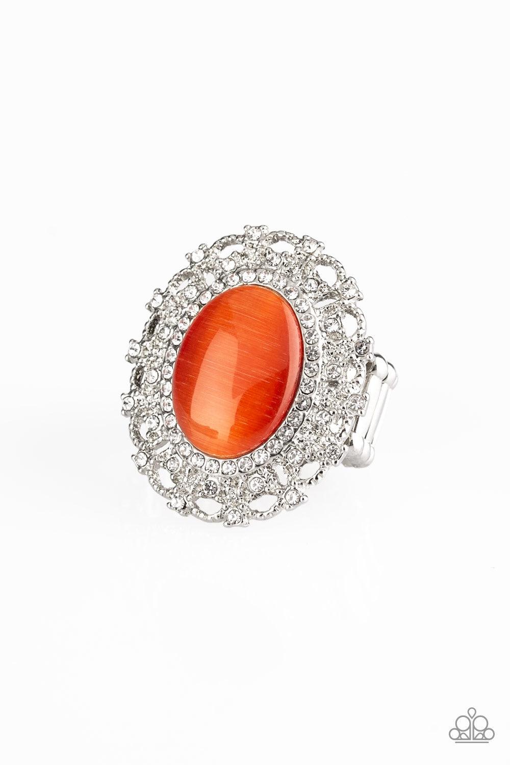 Paparazzi Accessories BAROQUE The Spell - Orange Encrusted in dainty white rhinestones, a frilly silver frame spins around a glowing orange moonstone center for a regal look. Features a stretchy band for a flexible fit. Jewelry