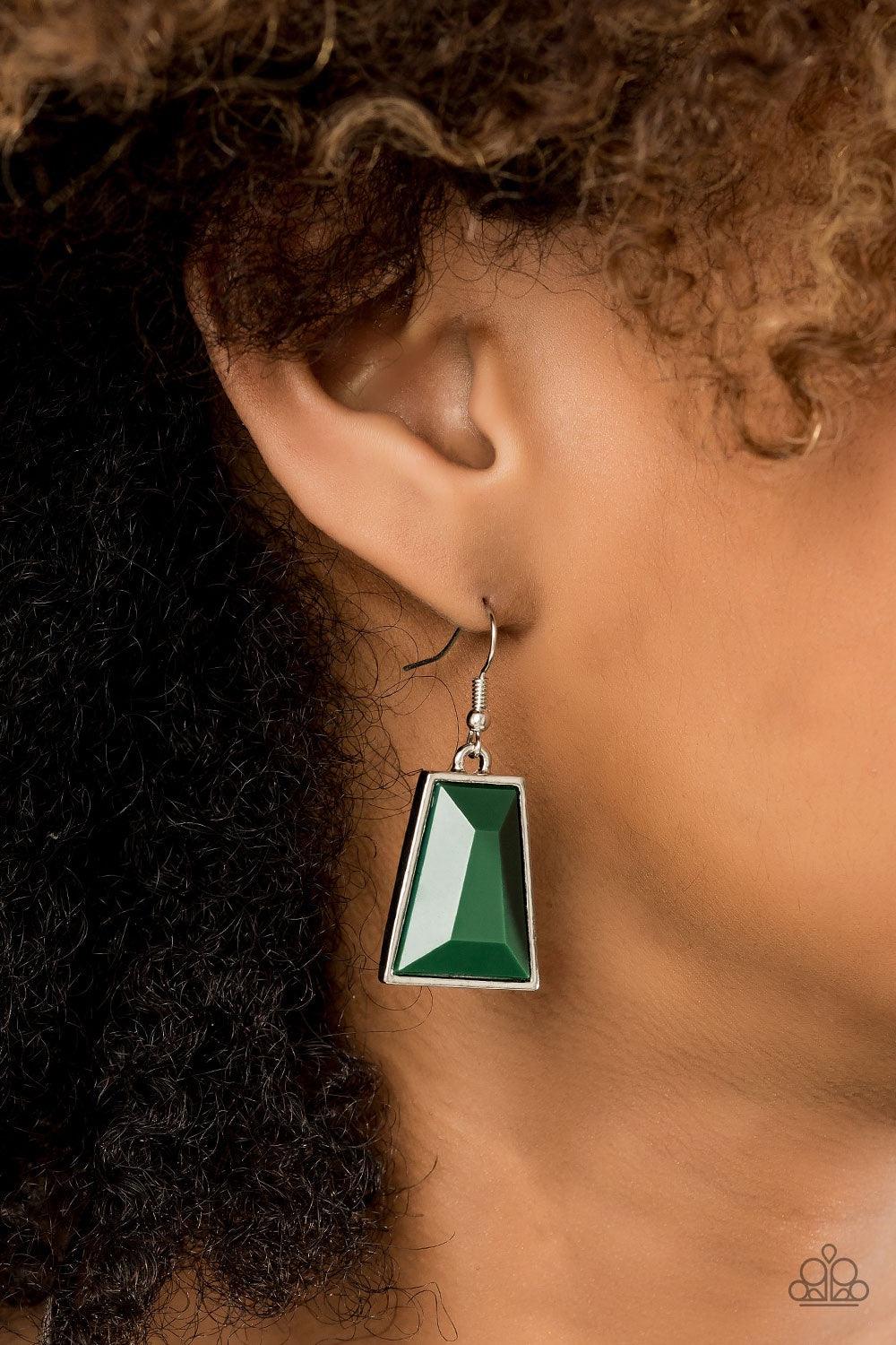 Paparazzi Accessories Lions, TIGRESS, and Bears - Green Tinted in the lush green hue of Eden, rows of faceted emerald-shaped beads link into colorful beaded plates. The uppermost frame slides along a bowing silver bar, adding playful movement to this fier
