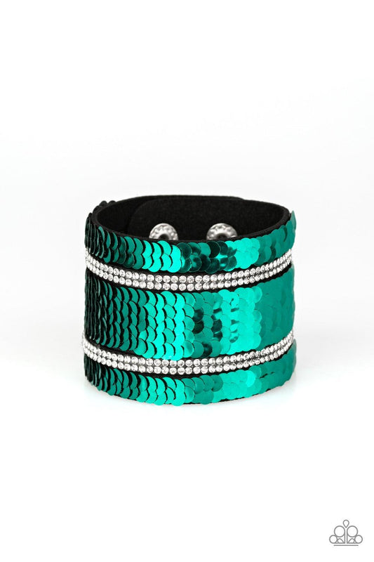 Paparazzi Accessories Mermaid Service - Green Infused with strands of blinding white rhinestones, row after row of shimmery sequins are stitched across the front of a spliced black suede band. Bracelet features reversible sequins that change from silver t