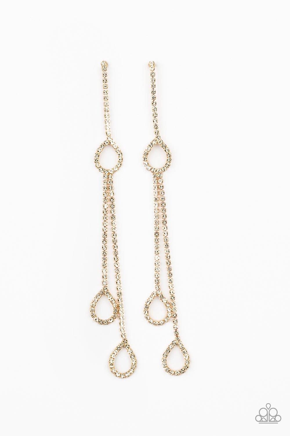 Paparazzi Accessories Chance of REIGN - Gold Dainty strands of glittery white rhinestones stream from the bottom of a teardrop frame. Matching teardrop frames drip from the bottom of glittery tassels for a timeless finish. Earring attaches to a standard p