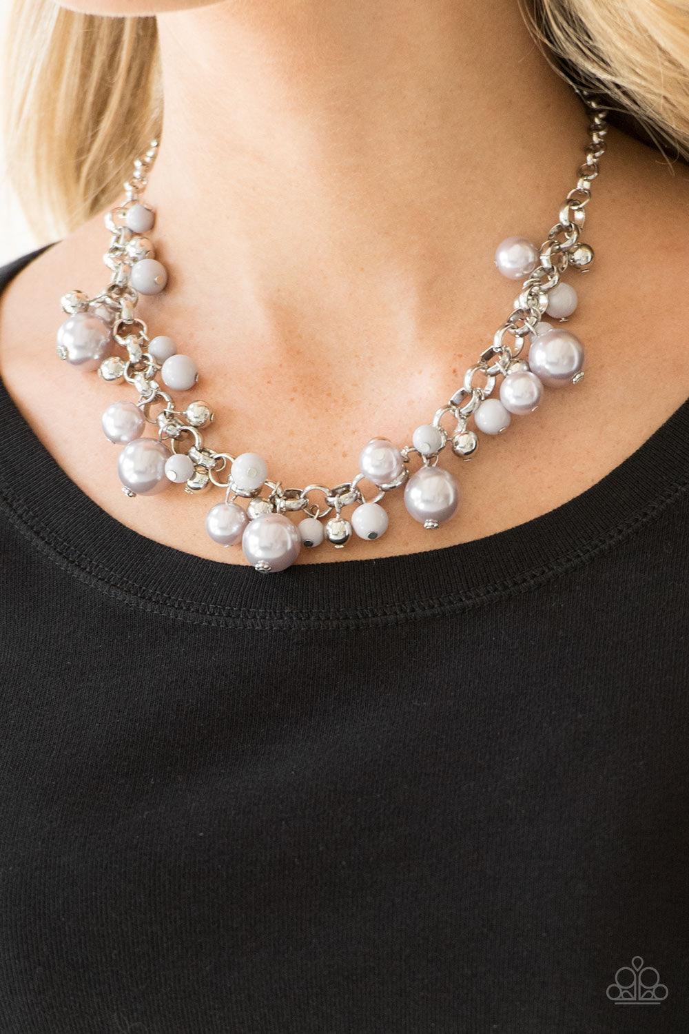 Paparazzi Accessories The Upstater - Silver Varying in size, bubbly silver pearls, classic silver beads, and shiny gray beads swing from the bottom of a glistening silver chain, creating a refined fringe below the collar. Features an adjustable clasp clos