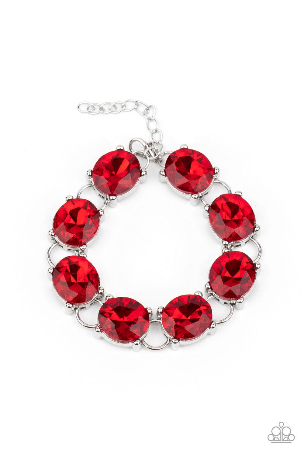 Paparazzi Accessories Mind Your Manners - Red Featuring sleek silver settings, a blinding collection of oversized red rhinestones dramatically link across the wrist for a glamorous fashion. Features an adjustable clasp closure. Sold as one individual brac