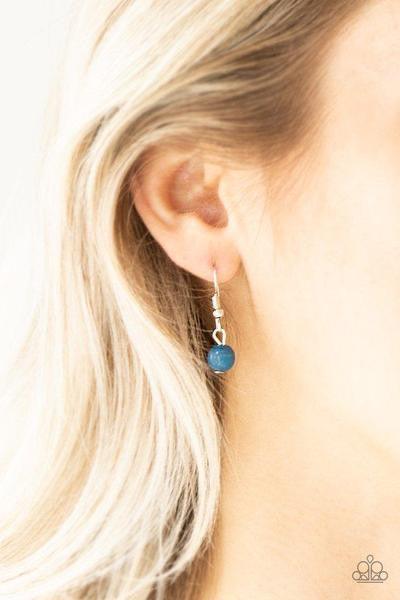 Paparazzi Accessories Flirty Foxtrot - Blue Smooth and hammered silver rings join clusters of refreshing blue beads along a shimmery silver chain for a colorful look. Features an adjustable clasp closure. Sold as one individual necklace. Includes one pair