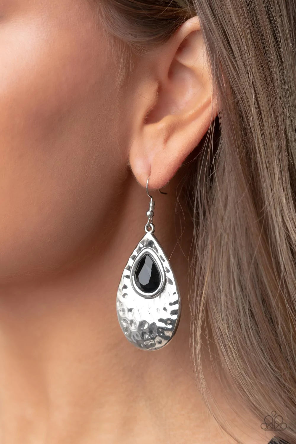 Paparazzi Accessories Tranquil Trove A shiny rose gold or silver teardrop is hammered in texture, creating a radiant display as the light bounces off each beveled surface. A faceted iridescent teardrop gem with Pale Rosette undertones is pressed into the