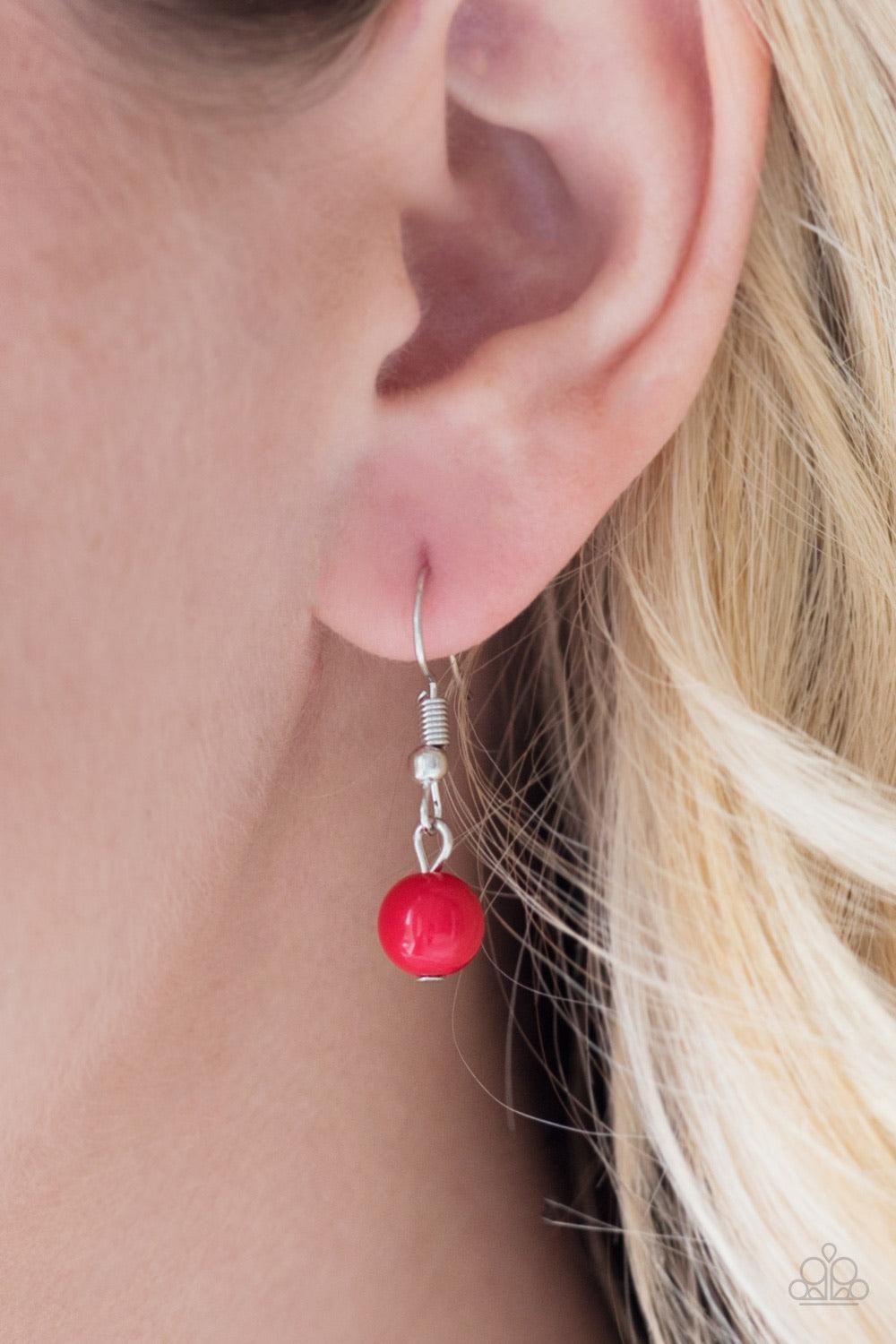 Paparazzi Accessories The SUMMERTIME of Your Life! - Red Featuring textures derived from nature, shimmery silver discs give way to sections of glistening silver chains for a whimsical look. Glassy and polished red beads trickle between silver accents for