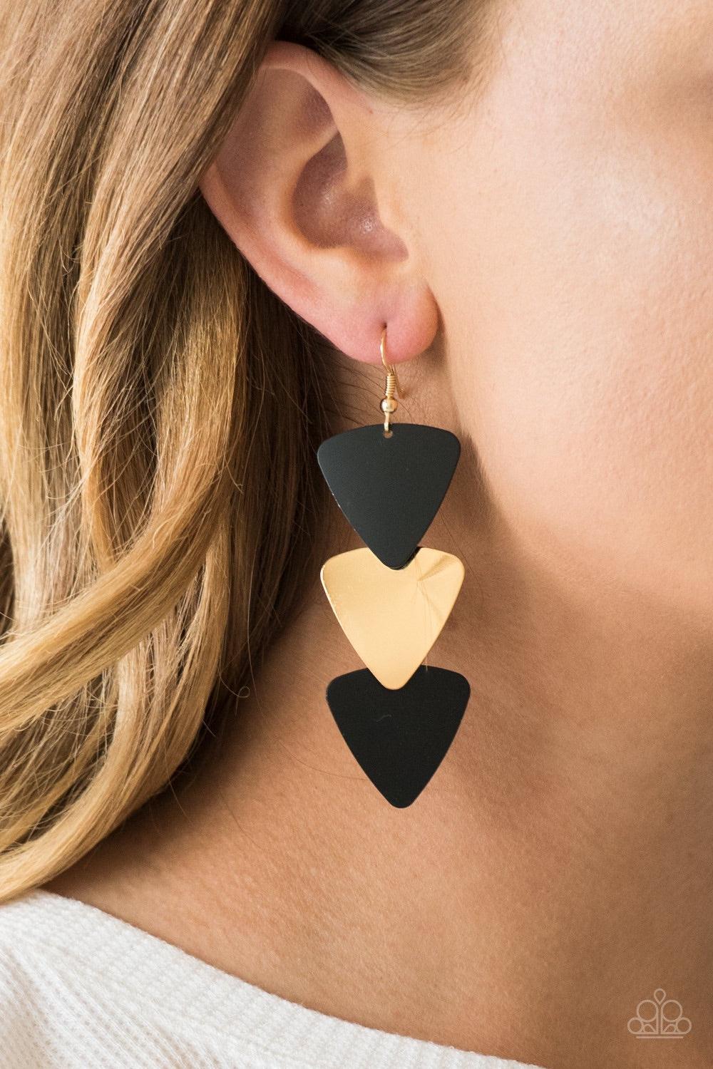 Paparazzi Accessories Terra Trek - Black Brushed in a high-sheen shimmer, glistening black and gold triangular frames cascade from the ear, creating an edgy lure. Earring attaches to a standard fishhook fitting. Jewelry