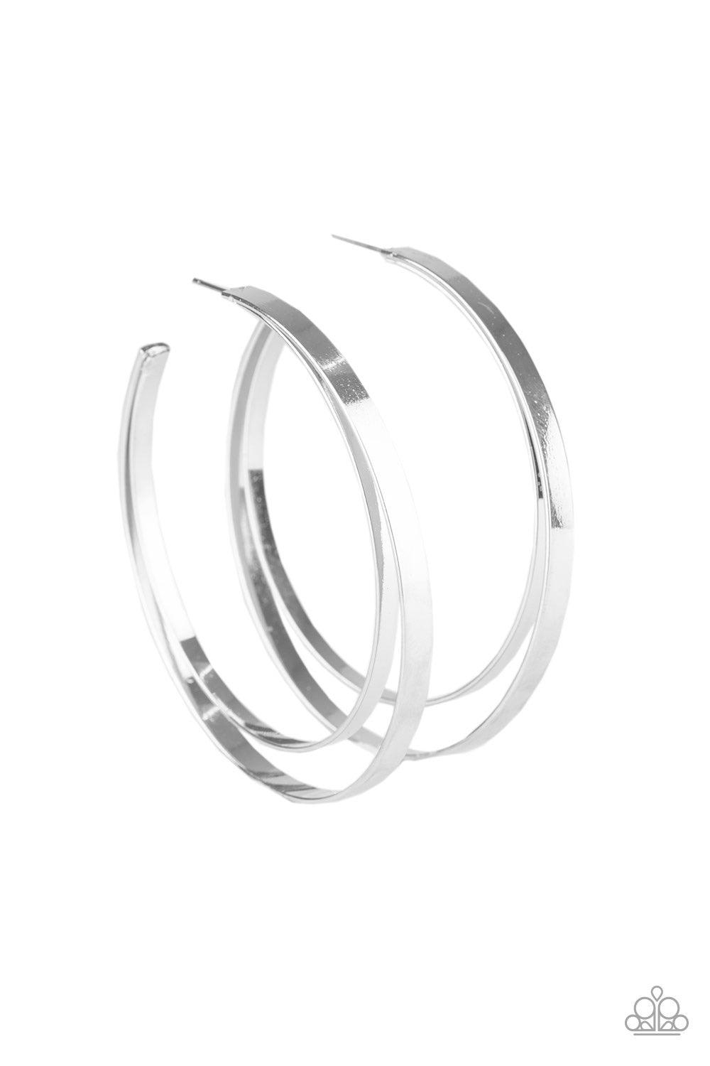 Paparazzi Accessories Moon Child Metro - Silver Two flat silver bars curl into a stacked hoop for a sleek look. Earring attaches to a standard post fitting. Hoop measures 2 3/4" in diameter. Jewelry