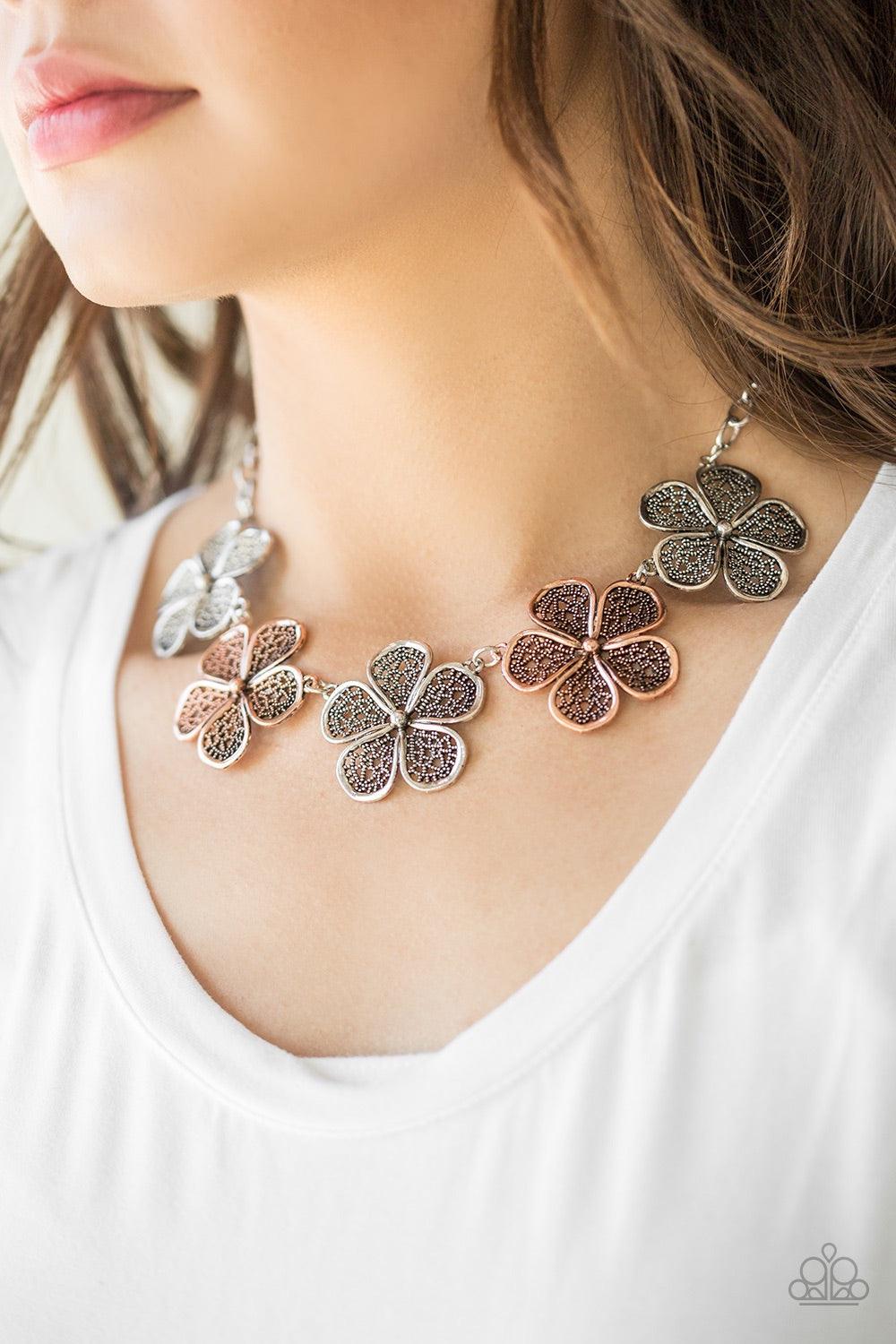 Paparazzi Accessories No Common Daisy - Multi Featuring lace-like petals, glistening copper and silver daisies link below the collar for a seasonal look. Features an adjustable clasp closure. Jewelry