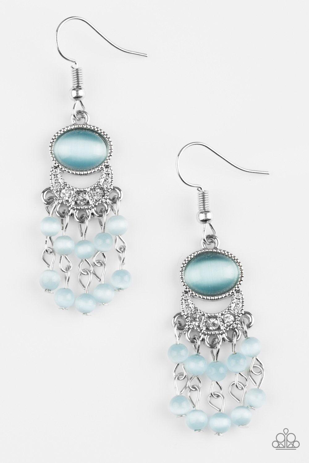 Paparazzi Accessories A Spring State Of Mind - Blue A glassy blue moonstone gives way to a bowing silver frame encrusted in dazzling white rhinestones. Stacks of dainty blue moonstone beading cascade from the bottom of the frame, creating a whimsical frin
