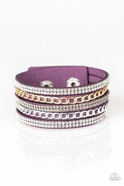 Paparazzi Accessories Fashion Fiend - Purple Glassy white and smoky rhinestones are encrusted along strands of purple suede. Glistening silver and gold chains are added to the bands, adding edgy industrial shimmer to the sassy palette. Features an adjusta