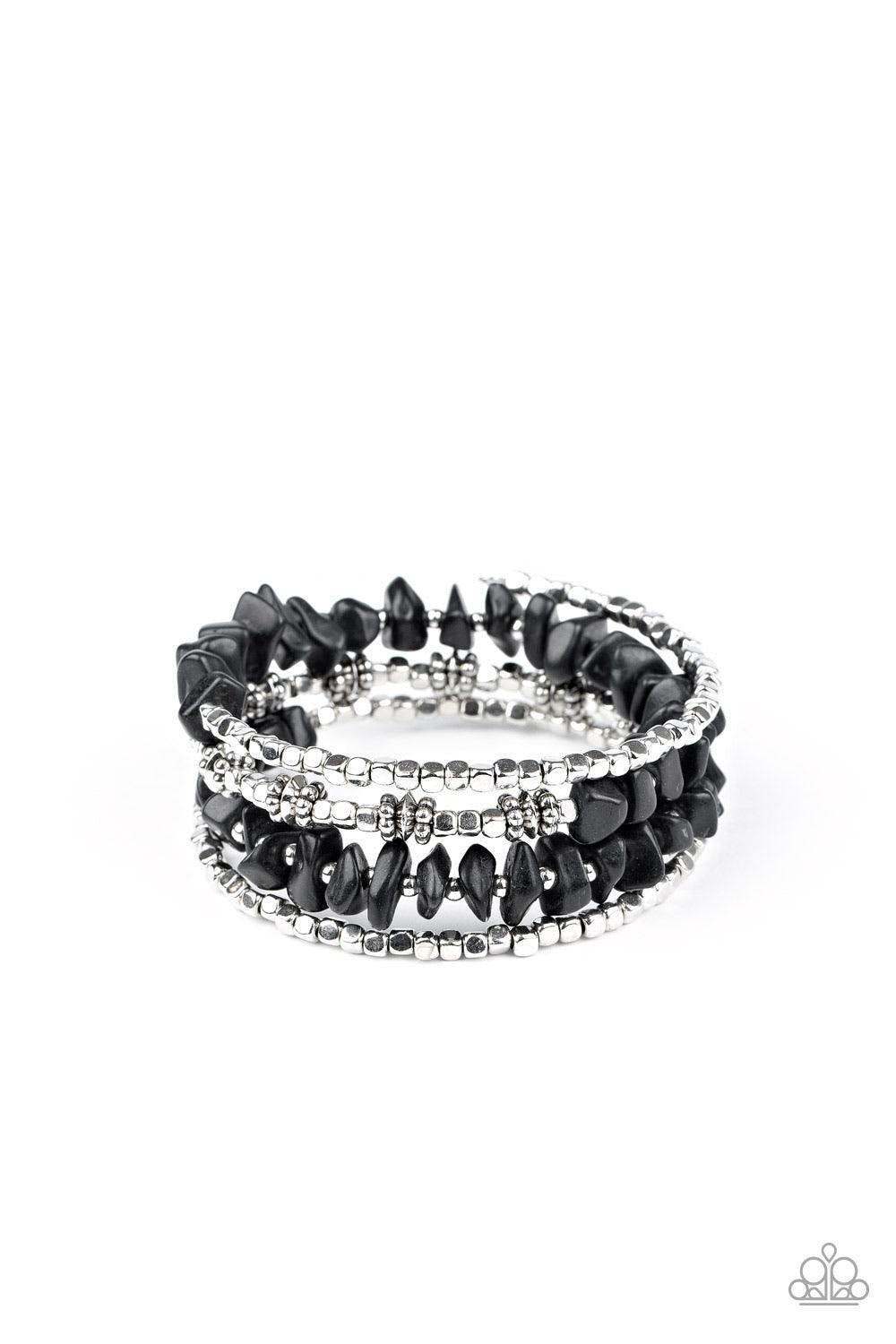 Paparazzi Accessories Rocking Renegade - Black An earthy collision of black stone beads, silver cubes, and decorative silver accents are threaded along a silver wire that coils around the wrist, creating a whimsical infinity wrap bracelet. Sold as one ind