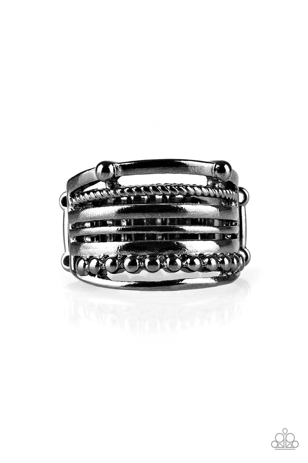 Paparazzi Accessories The STEEL of Night - Black Featuring smooth, dotted, and textured finishes, mismatched gunmetal bands layer across the finger for a bold industrial look. Features a stretchy band for a flexible fit. Jewelry