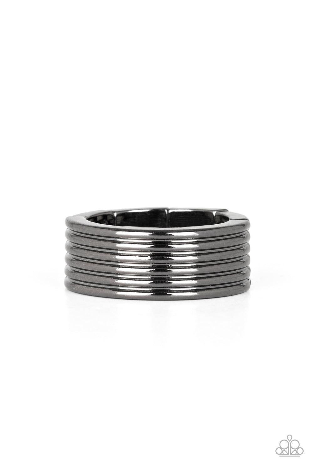 Paparazzi Accessories A Mans Man - Black A thick gunmetal band is lined in stacked linear textures for a sleek metro look. Features a stretchy band for a flexible fit. Jewelry