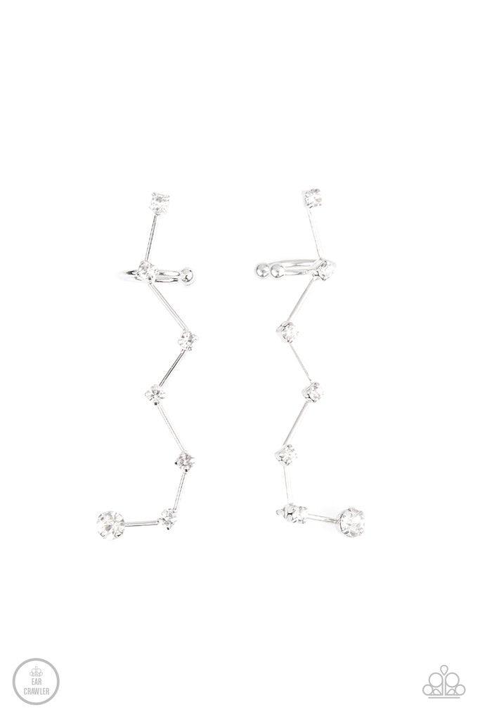 Paparazzi Accessories Constellation Prize - White Dotted with dainty white rhinestones, zigzagging silver bars delicately climb the ear, creating a sparkly constellation. Earring attaches to a standard post fitting. Features a dainty cuff attached to the