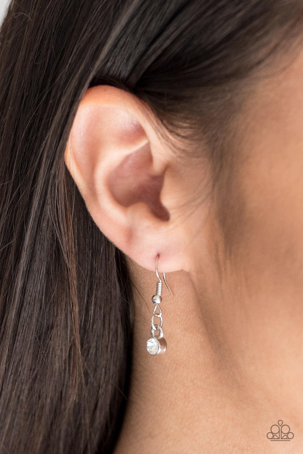 Paparazzi Accessories Pampered Princess - Pink Dainty white rhinestones are encrusted along the bottom of a dainty pink bead, creating a glamorous pendant below the collar. Features an adjustable clasp closure. Sold as one individual necklace. Includes on