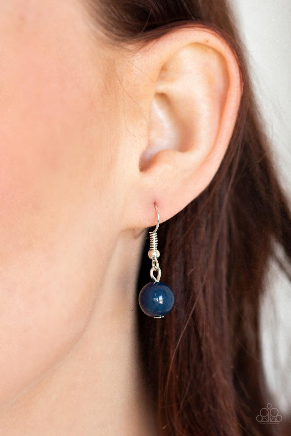Paparazzi Accessories 5th Avenue Frenzy - Blue Nestled between sleek silver fittings, timeless Evening Blue beads gradually increase in size as they trickle along a dainty silver chain across the chest for a colorfully classic look. Features an adjustable
