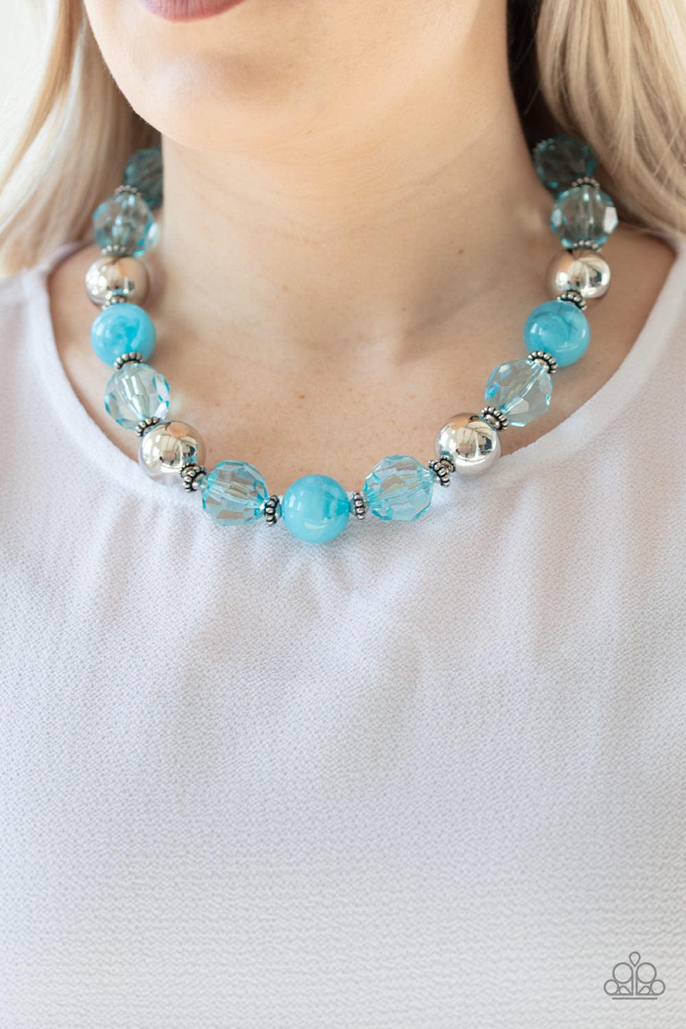 Paparazzi Accessories Very Voluminous ~Blue Infused with dainty silver accents, an exaggerated display of oversized silver beads, faceted blue crystal-like beads, and cloudy blue beads are threaded along an invisible wire below the collar for a colorfully