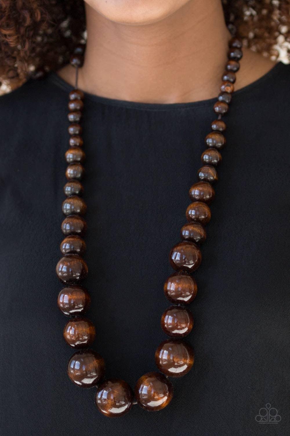 Paparazzi Accessories Effortlessly Everglades - Brown Gradually increasing in size near the center, earthy wooden beads are threaded along a brown string for a summery look. Features an adjustable sliding knot closure. Jewelry