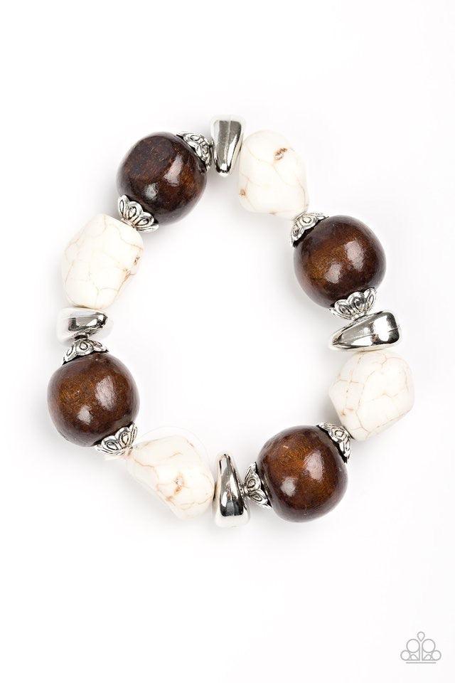 Paparazzi Accessories Gorgeously Grounded - White Infused with ornate silver accents, refreshing white stones and earthy wooden beads are threaded along a stretchy elastic band for a seasonal look. Jewelry