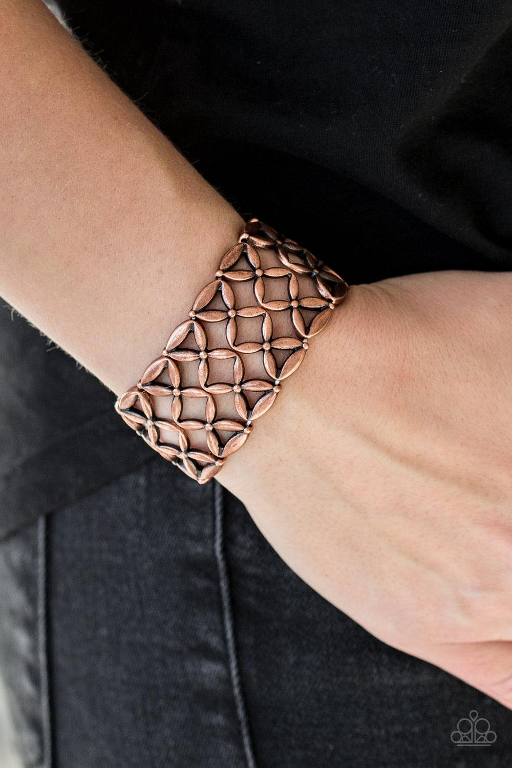 Paparazzi Accessories The Big BLOOM - Copper Shimmery copper floral frames are threaded along a stretchy band, stacking into a bold seasonal look. Sold as one individual bracelet. Jewelry