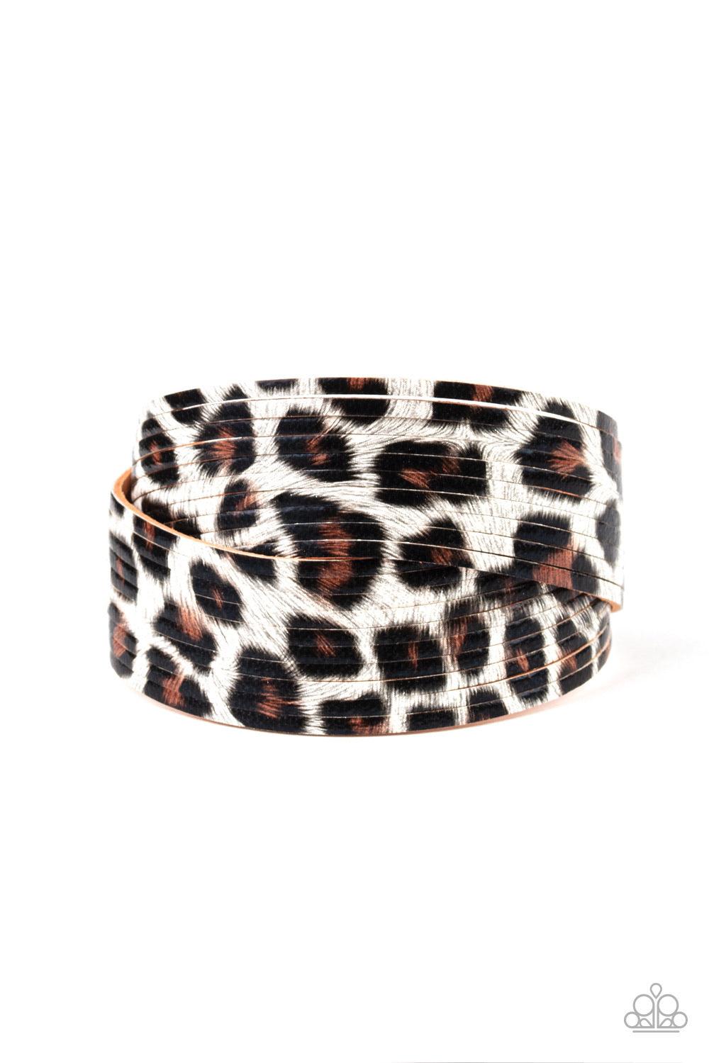 Paparazzi Accessories Hey GRRirl - White Painted in a lifelike white, brown, and black cheetah print, thick leather bands have been spliced into layers that wave across the wrist for a wild look. Features an adjustable snap closure. Sold as one individual