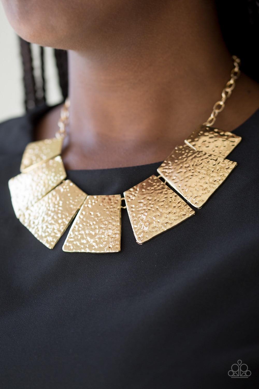 Paparazzi Accessories Here Comes Huntress - Gold Featuring flared edges, delicately hammered gold plates link below the collar for a fierce look. Features an adjustable clasp closure. Jewelry