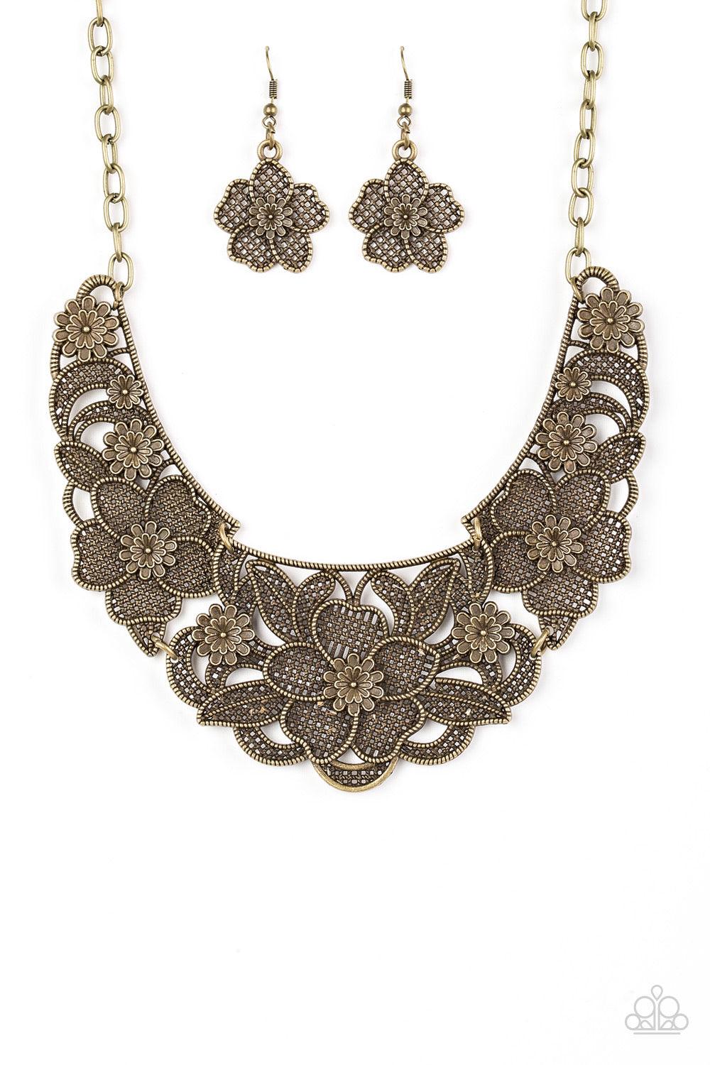 Paparazzi Accessories Petunia Paradise - Brass Featuring lattice-like patterns, shimmery brass flowers bloom below the collar for a seasonal look. Features an adjustable clasp closure. Sold as one individual necklace. Includes one pair of matching earring