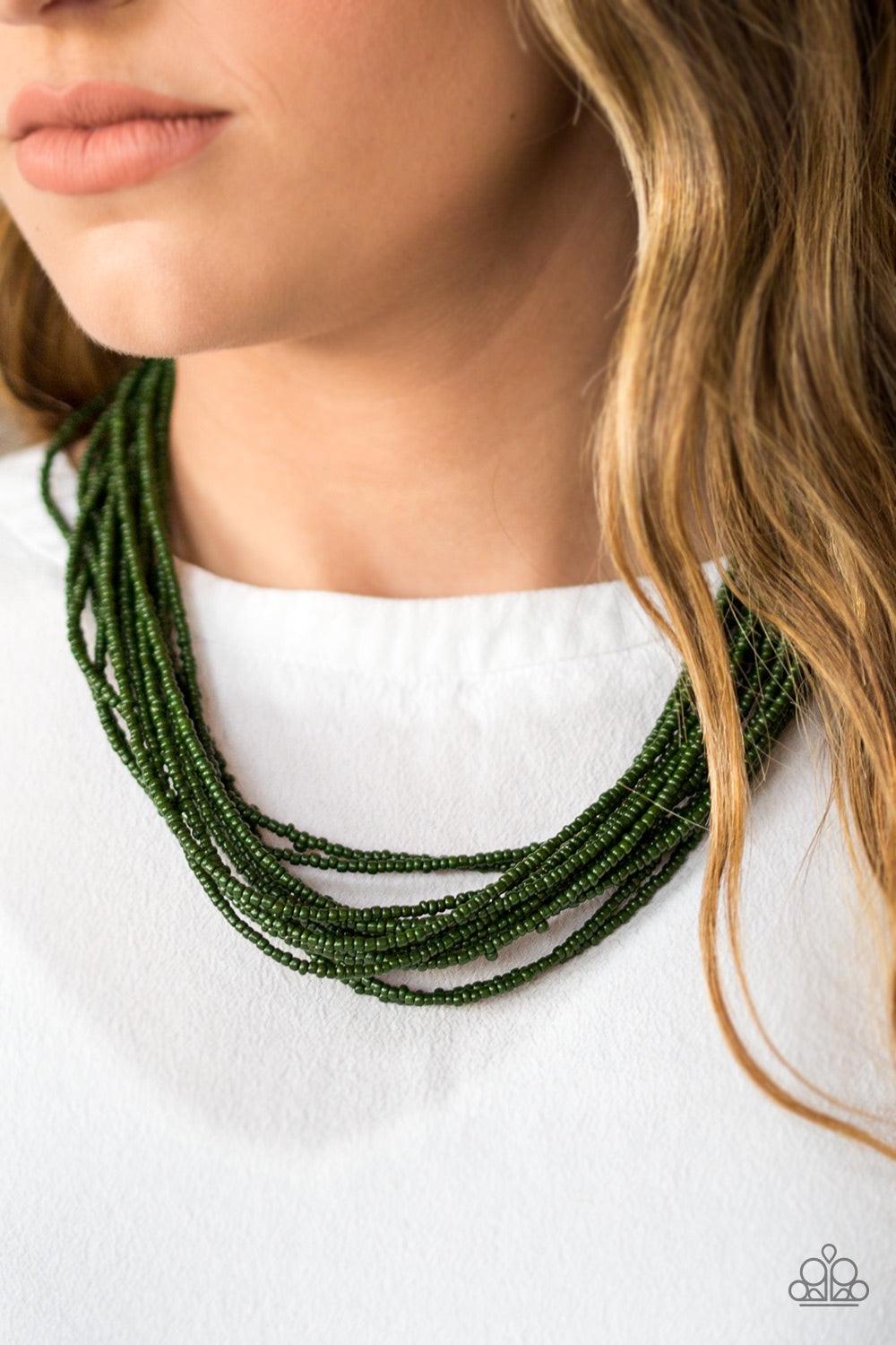 Paparazzi Accessories Wide Open Spaces - Green Infused with two large silver fittings, refreshing green seed beads are threaded along countless strands, creating dramatic layers below the collar for a seasonal look. Features an adjustable clasp closure. J