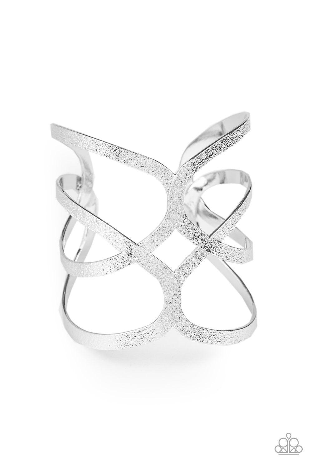 Paparazzi Accessories Crossing The Finish Line - Silver Delicately hammered in endless shimmer, glistening silver bars crisscross across the wrist, coalescing into a bold cuff. Jewelry