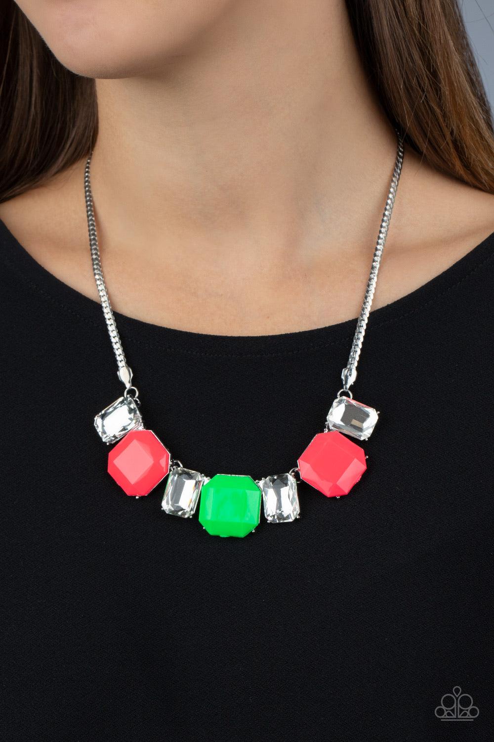 Paparazzi Accessories Royal Crest - Pink Neon pink and green beads connect with exaggerated emerald style white rhinestones, creating vivacious sparkle below the collar. Features an adjustable clasp closure. Sold as one individual necklace. Includes one p